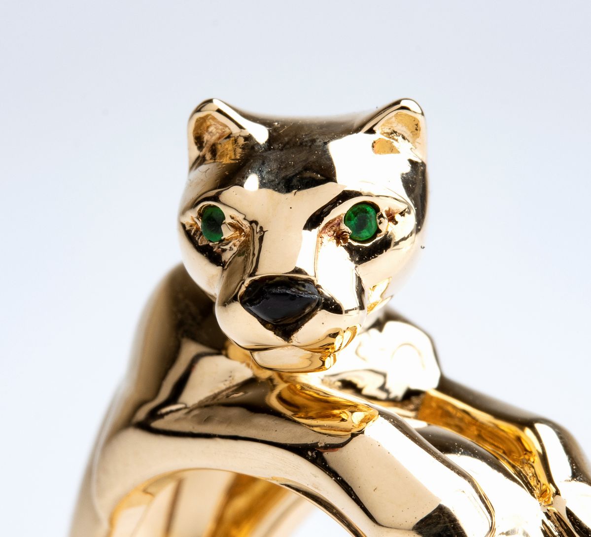 CARTIER: anello Panthère con onice e smeraldi