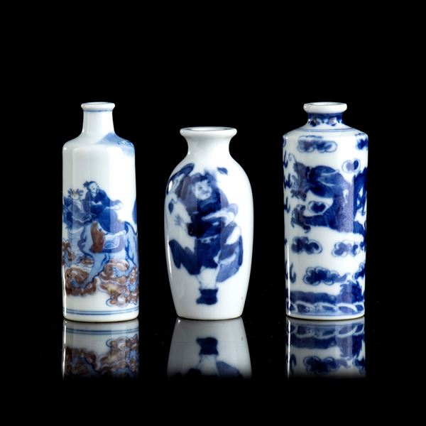 THREE 'BLUE AND WHITE' PORCELAIN SNUFF BOTTLES