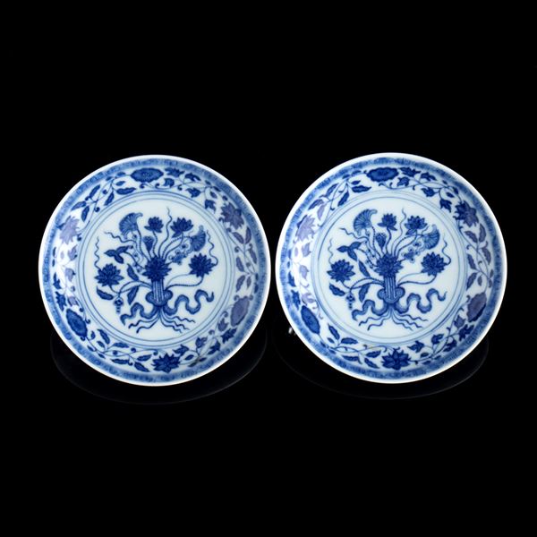 TWO 'BLUE AND WHITE' PORCELAIN SAUCERS