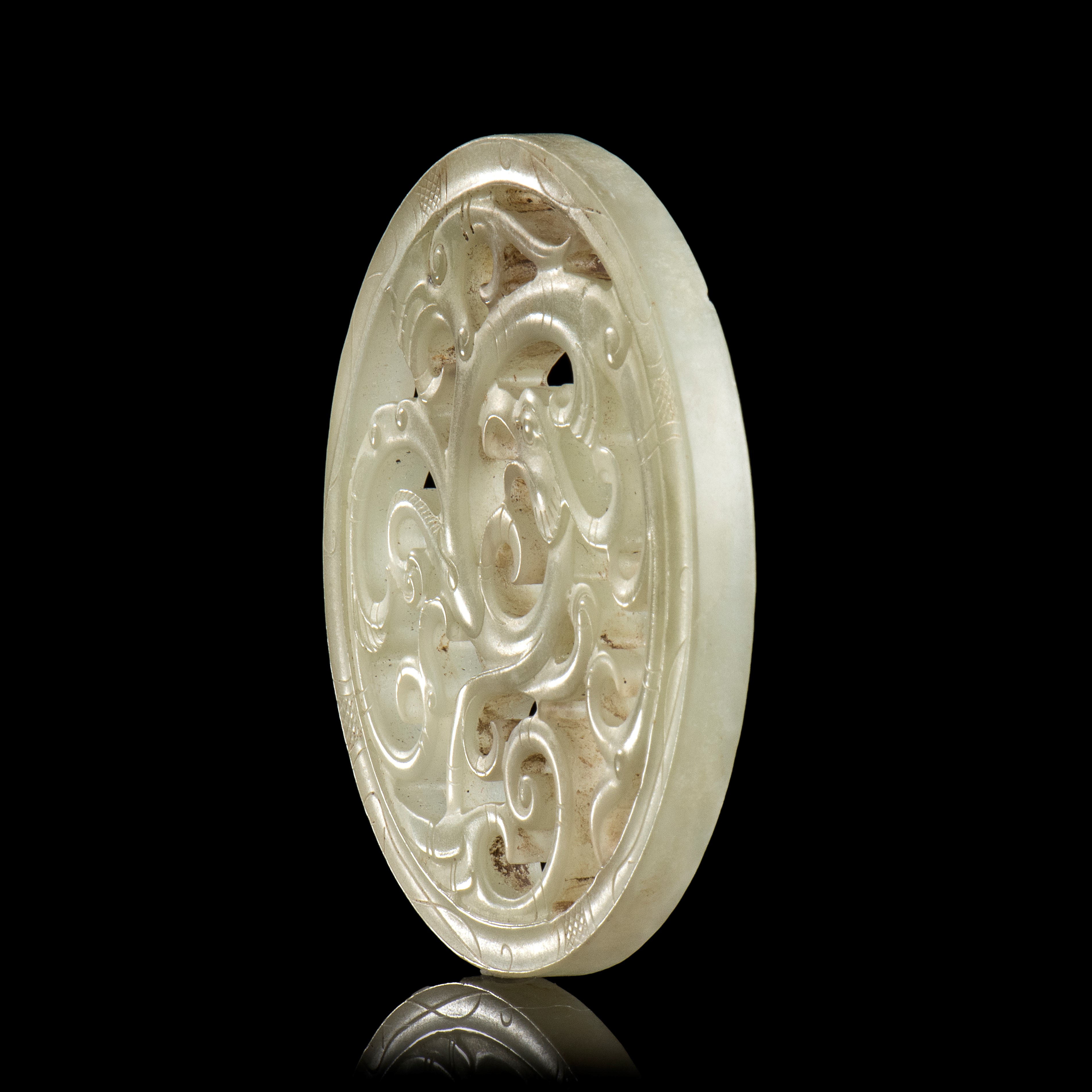 PLACCA CIRCOLARE IN GIADA VERDE CHIARO CON DRAGO