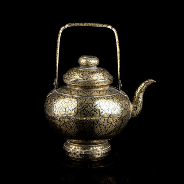 A RARE AND LARGE GILDED SILVER NIELLO TEAPOT