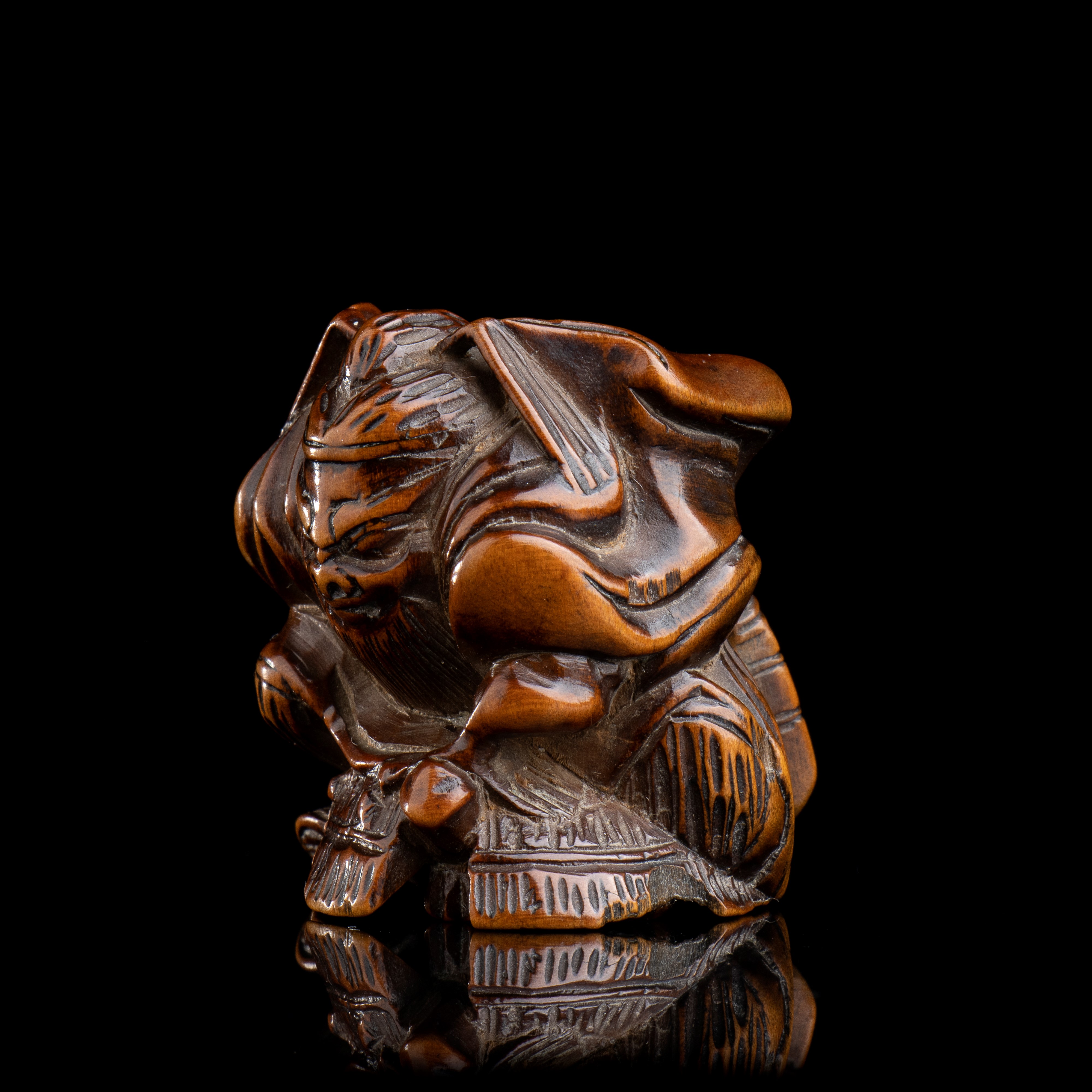 NETSUKE IN LEGNO CON SHOKI