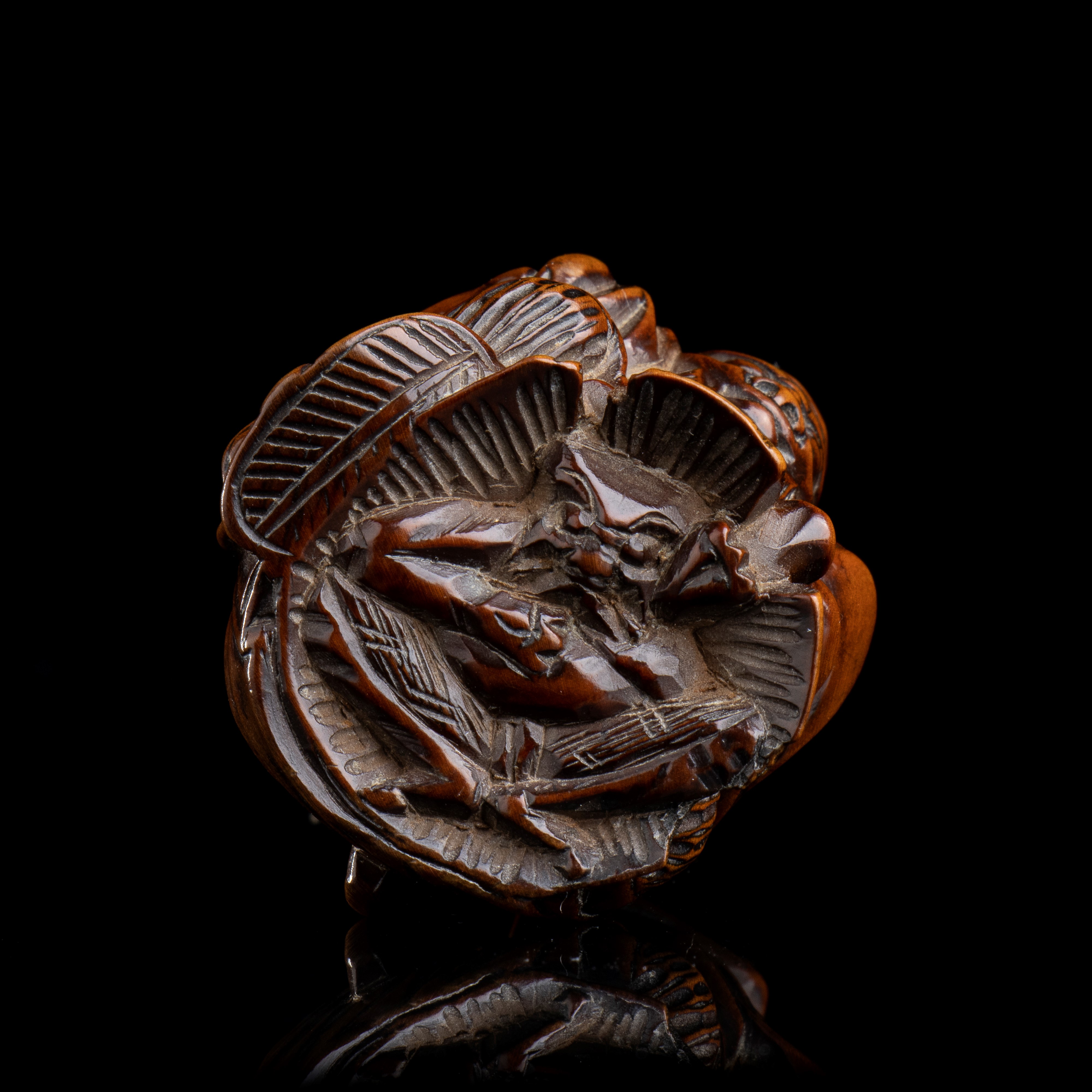 NETSUKE IN LEGNO CON SHOKI