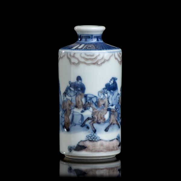 A 'BLUE AND WHITE' AND COPPER RED PORCELAIN SNUFF BOTTLE