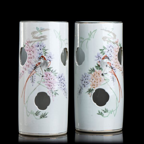 A PAIR OF POLYCHROME ENAMELLED CYLINDRICAL CONTAINERS 