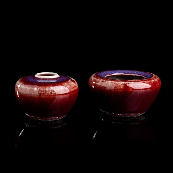 TWO FLAMBÉ GLAZED PORCELAIN CONTAINERS