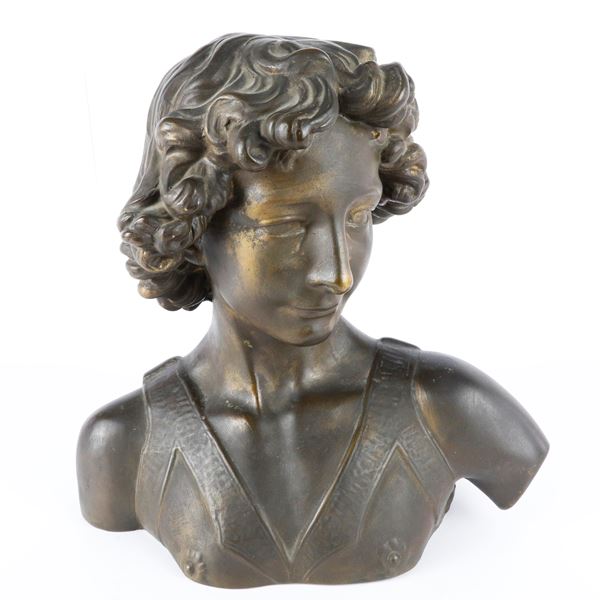 Bust of a boy sculpture in the round,