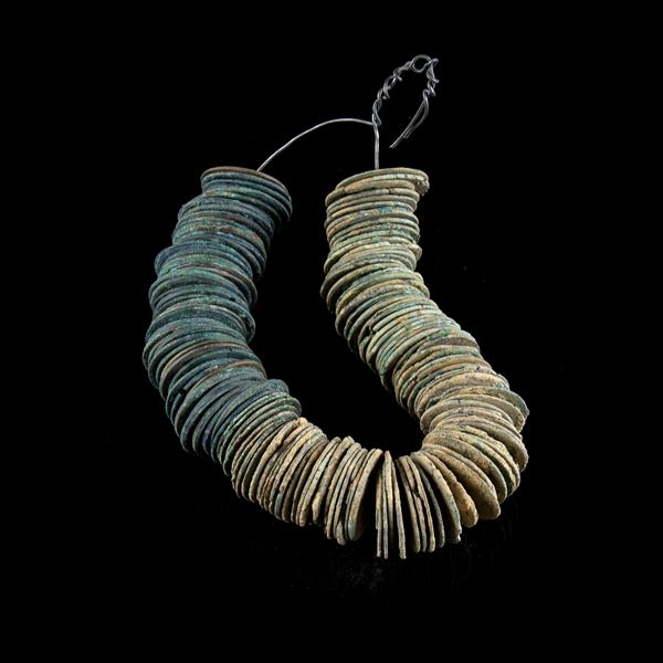 A NECKLACE OF COINS