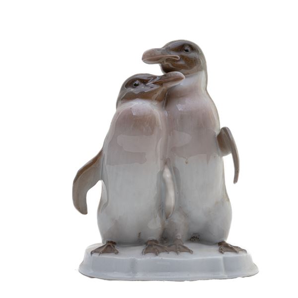 Pair of penguins, polychrome porcelain group