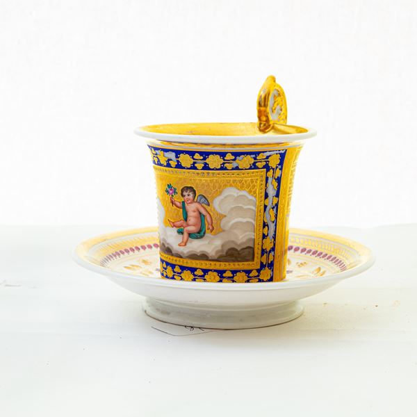 Cup and plate in polychrome porcelain,