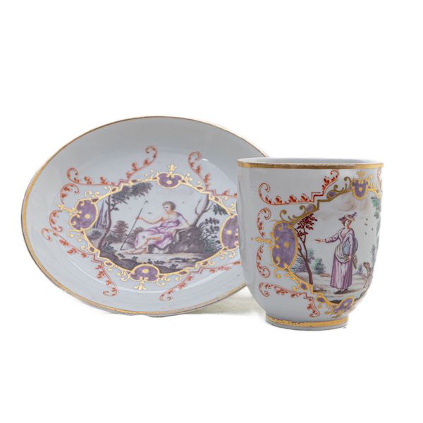 White porcelain cup and plate with Saxon decoration