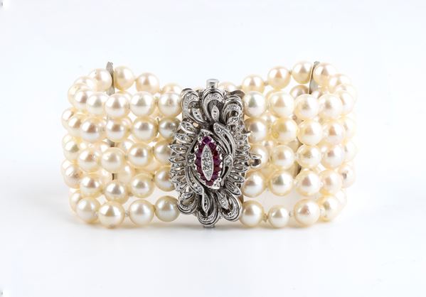 5 strand saltwater cultured pearl bracelet, gold clasp set with diamond and ruby