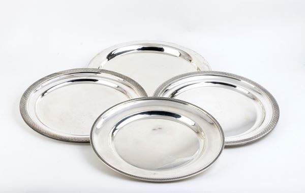 Quattro piatti in argento - Italia, XX secolo
