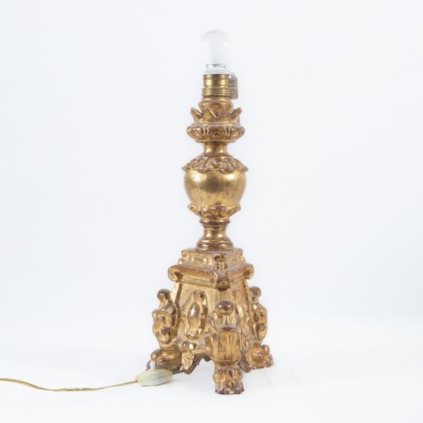 Electrified candlestick in gilded wood