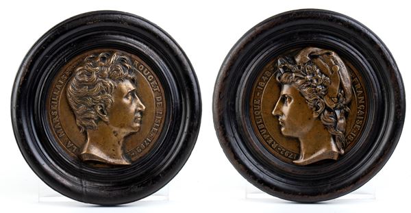  Two large bronze plaques with wooden frame