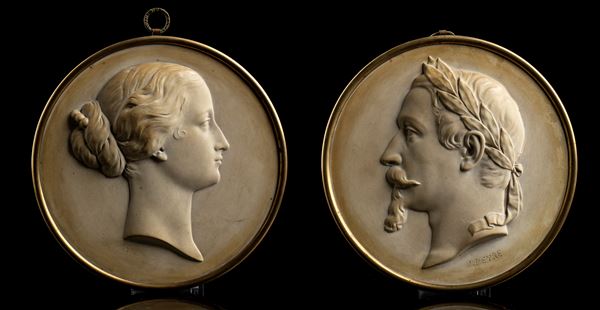 coppia di miniature in biscuit e cornice in bronzo dorato raffiguranti Napoleone III e l’imperatrice Eugenia, firmate J. Peyre