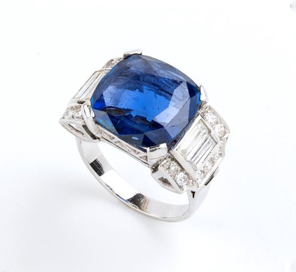 Blue sapphire diamond white gold ring 