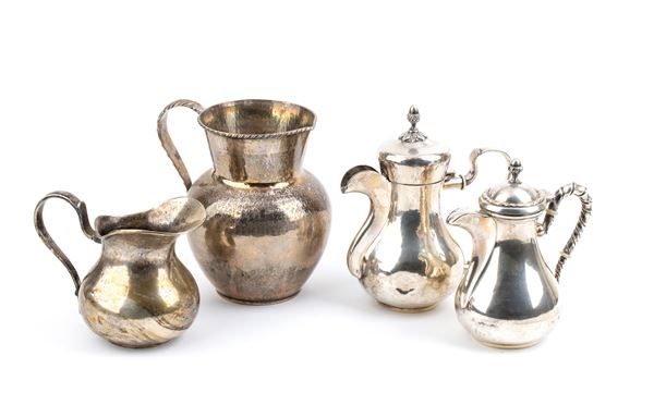 Lot of a milk jug, an amphora, and two tea urns