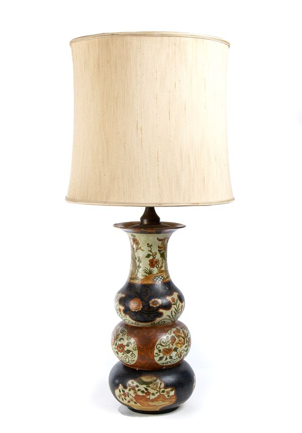 A PAINTED CERAMIC TRIPLE GOURD VASE MOUNTED AS A LAMP