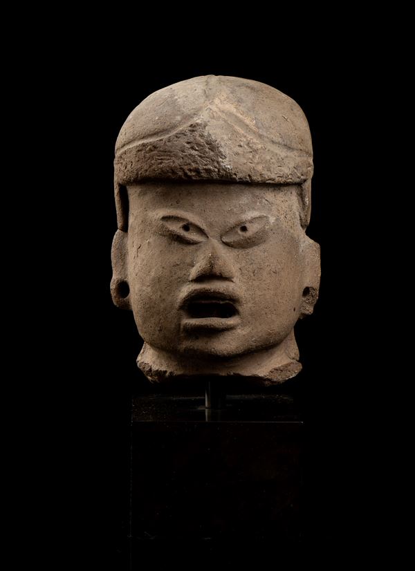 A CLAY OLMEC STYLE HEAD 