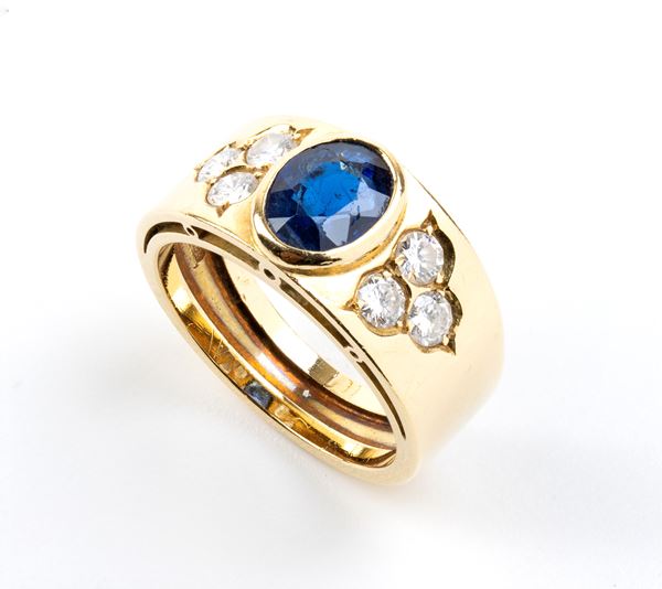 Blue sapphire diamond gold band ring    