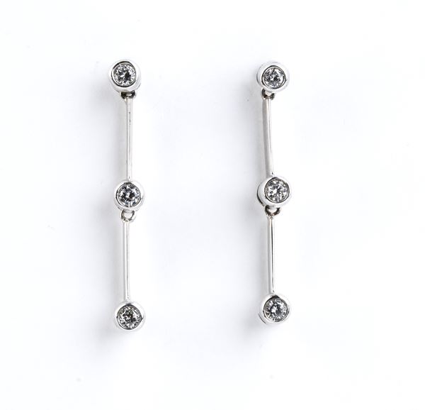 Gold pendant earrings with diamonds