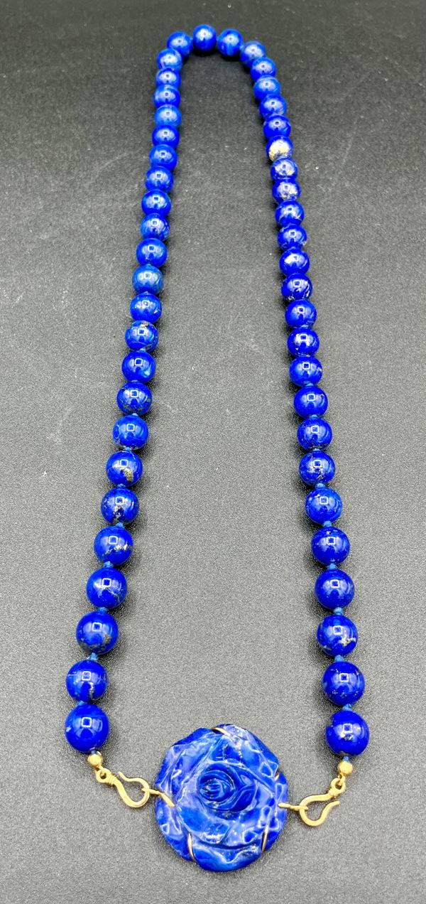 Lapis gold necklace and pair of earrings.  