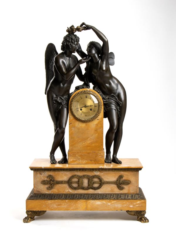 Ledure Bronzier H&#233;mon Her - A French bronze mantel clock depicting Cupid and Psych