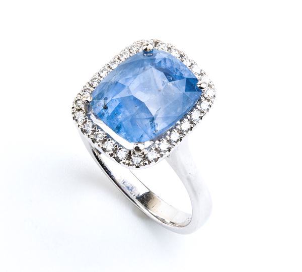 Gold ring with sapphire and diamonds
