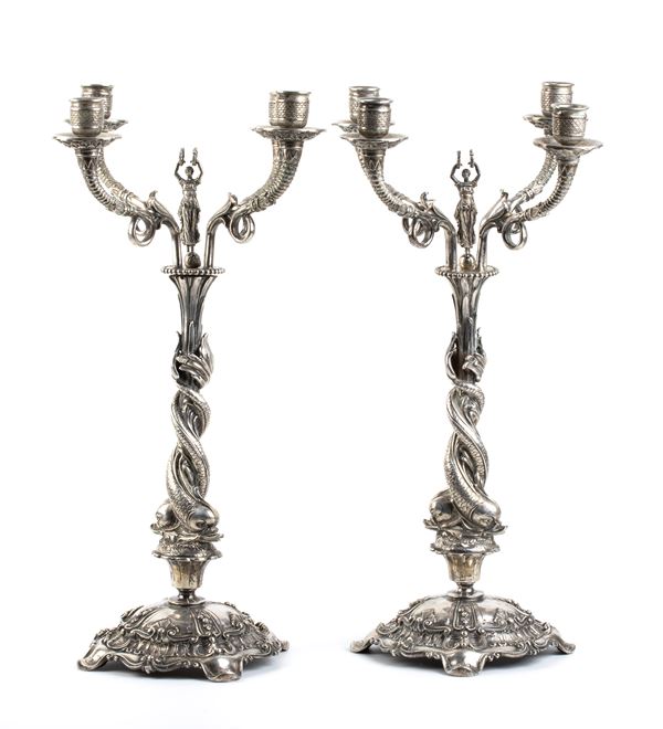 A pair of German silver candelabra
