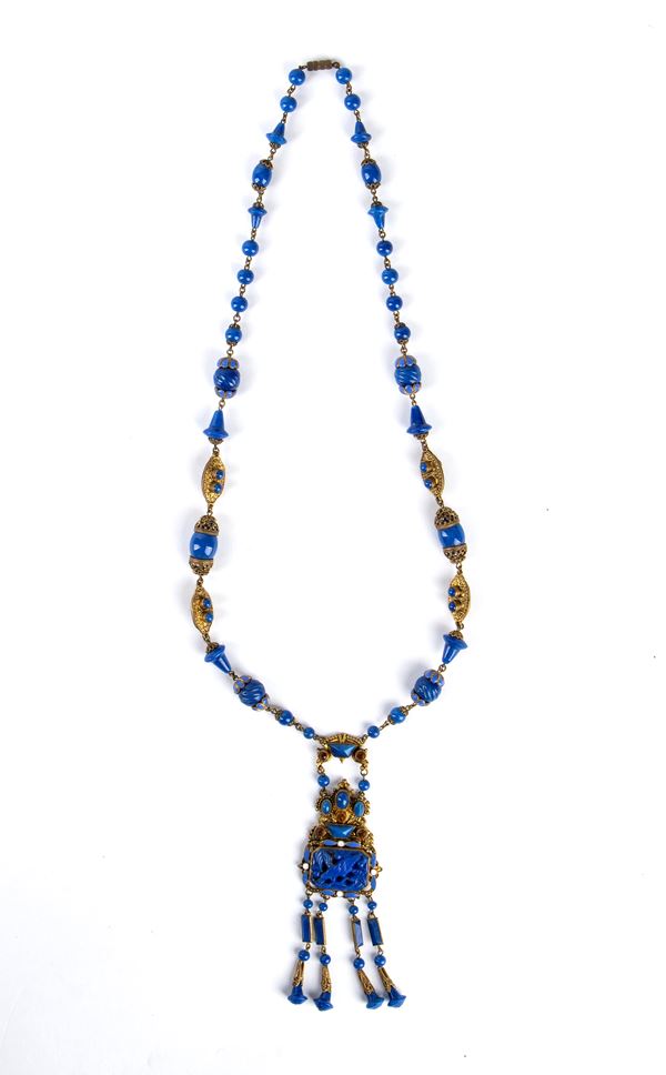 A GILT METAL AND STONE NECKLACE 