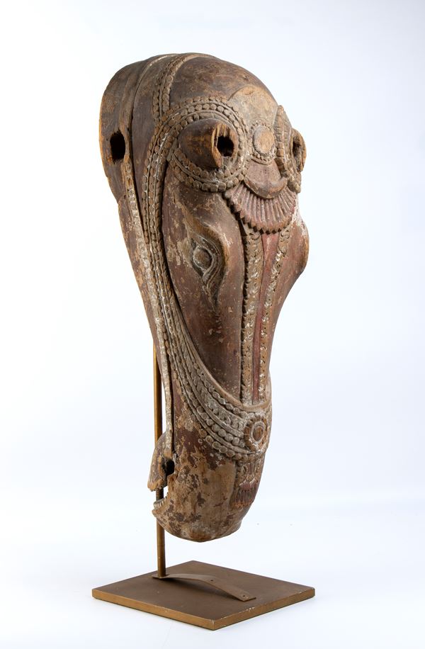 A LARGE PAINTED WOOD HORSE HEAD