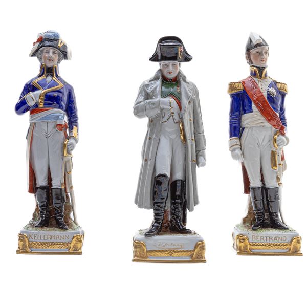 Lot of three polychrome porcelain soldiers