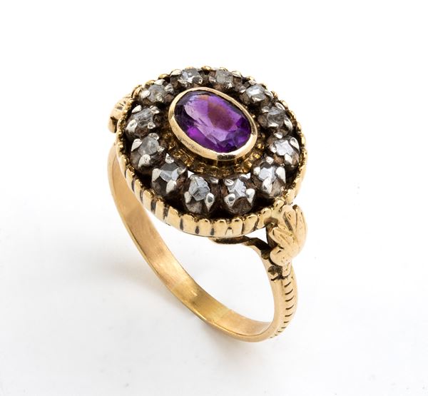 Gold and silver ring with diamonds and amethyst 
