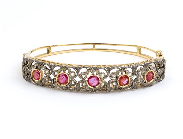Gold and silver rigid hoop bracelet  Gold and silver rigid bracelet with rubies and diamonds