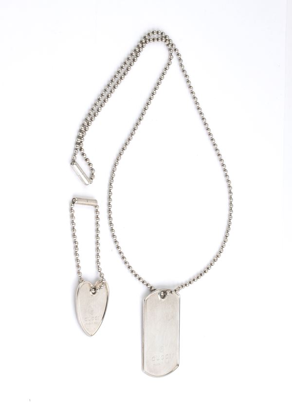 GUCCI - Two silver chains with pendants
