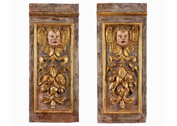 Pair of Italian panels depicting cherubs