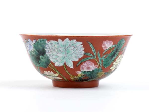 A POLYCHROME ENAMELLED PORCELAIN BOWL