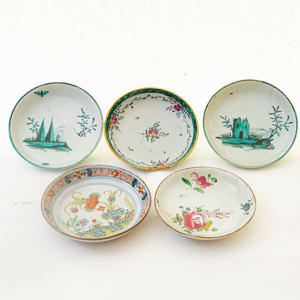 Lot of five polychrome ceramic plates: