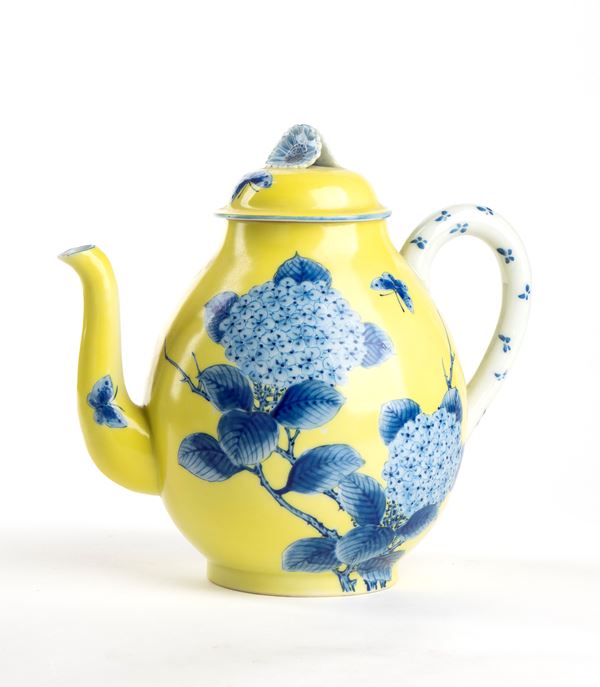 A POLYCHROME ENAMELLED TEAPOT