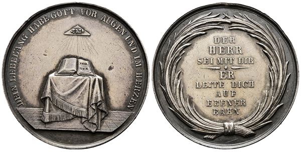 GERMANIA. Medaglia religiosa Cresimale con altare e Bibbia Ag. (19,20 g; 38,82 mm). Piccolo colpetto al campo e al taglio