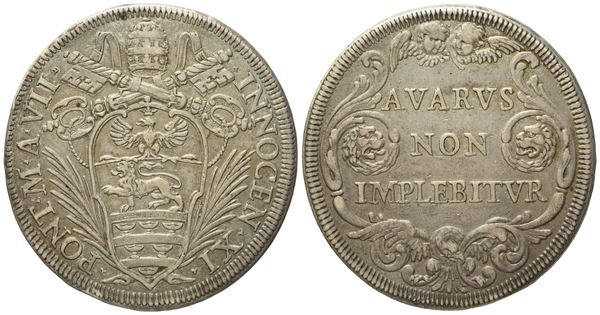 STATO PONTIFICIO. Roma. Innocenzo XI (1676 - 1689). Mezza piastra anno VII (1682). Ag (15,85 g; 37 mm)