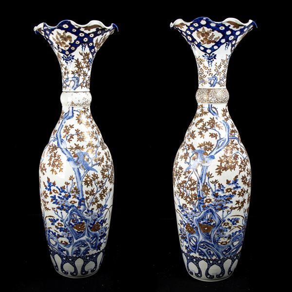 A PAIR OF POLYCHROME ENAMELLED MONUMENTAL BALUSTER VASES