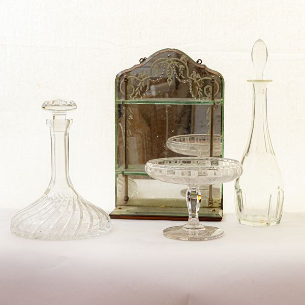 Lot of four objects: two  bottles, one centerpiece and one  mirror with shelves