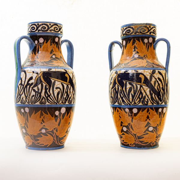 Pair of vases with deer