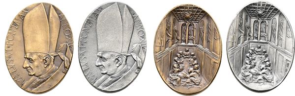 VATICANO. Paolo VI (1963-1978). Coppia di medaglie annuali anno XII 1974 in argento (40,22gr) e bronzo.
