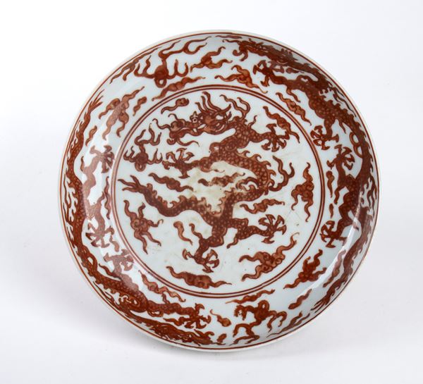 A RED COPPER ENAMELLED PORCELAIN DISH