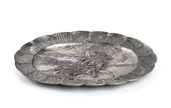 A SILVER METAL TRAY