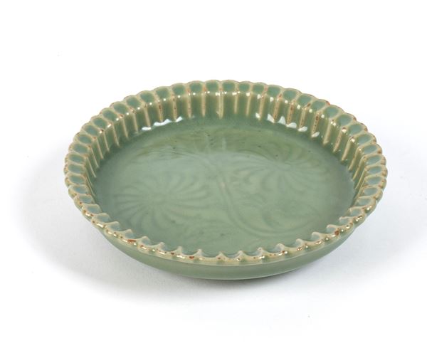 A SMALL CÉLADON GLAZED DISH