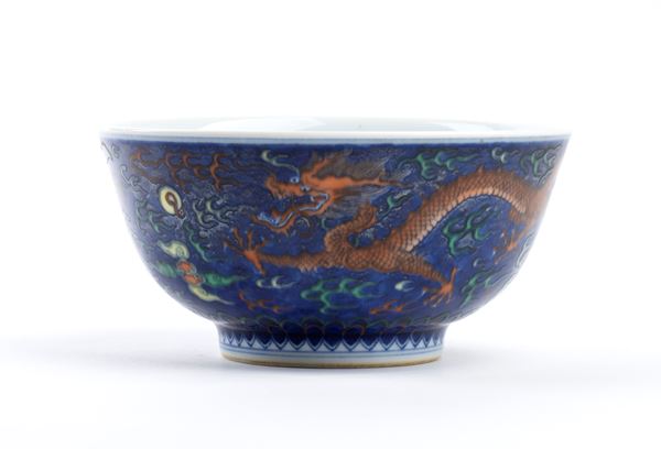 A POLYCHROME ENAMELLED PORCELAIN BOWL